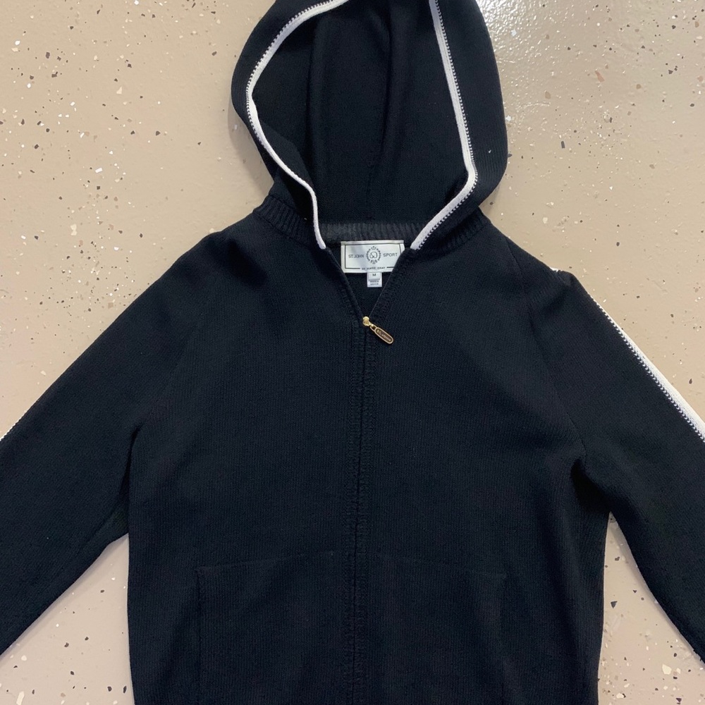 Black jogging suit with white stripe down the side
